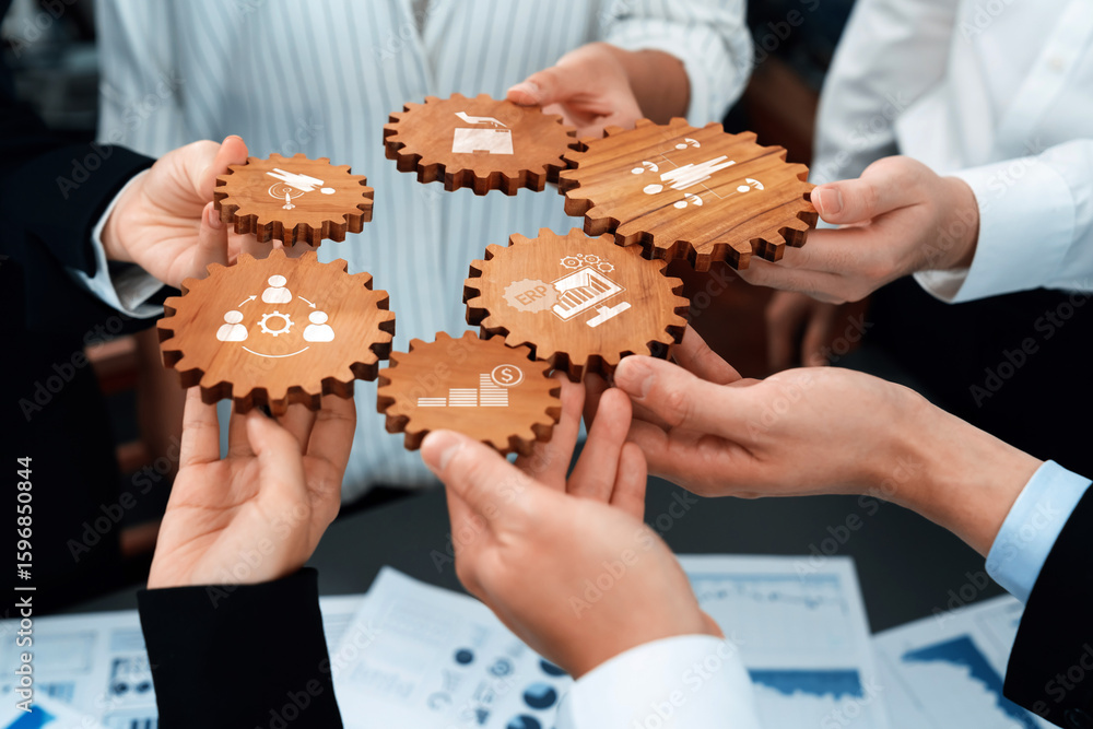 Poster collaborative teamwork with wooden gears representing business concepts and strategies in an office 