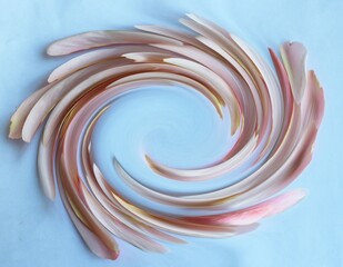 An abstract background of pink lines on a light blue background.
