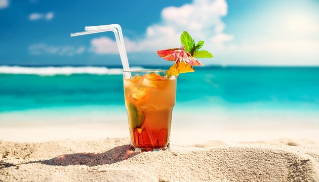 glass of cocktail stands on sand against backdrop of tropical sea idea of summer vacation