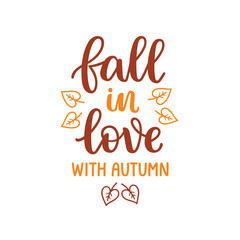 Fall in love with autumn hand lettering composition with heart shaped leaves