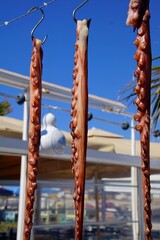 Fresh octopus tentacles at a seaside restaurant