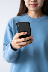 Person Holding Smartphone - Close Up of Hand and Device