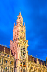 Obraz premium View at dusk of the Munich town hall, Bavaria, Germany, neo-Gothic building