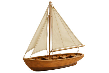 Obraz premium Wooden sailboat miniature sitting on transparent backdrop, representing nautical craftsmanship and maritime passion