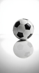 Naklejka premium Soccer ball on white background with soft studio lighting