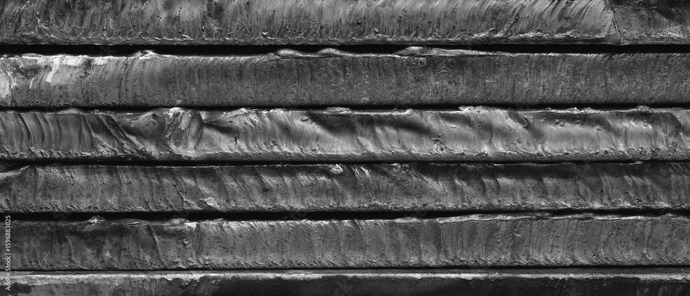 Poster stack of metal sheets with rust. plates are stacked on top of each other and have traces of laser pl