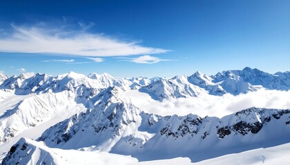 Snowy mountain peaks, clear blue sky
