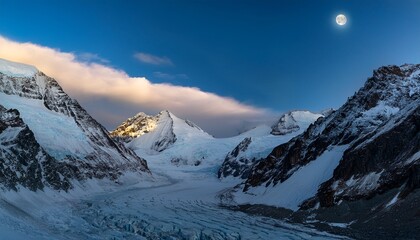 Obraz premium moonlit clouds and snow covered mountain peaks above fiescher glacier