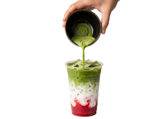 iced strawberry matcha latte pouring into a plastic cup