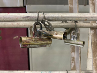 Old spring loaded clips used for hanging wet paint art while drying