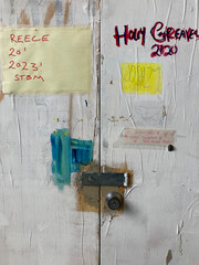 Old metal cupboard covered in paint in an art studio