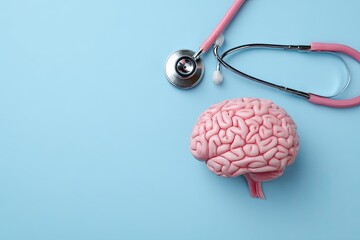 Pink brain model, stethoscope, blue background; medical research