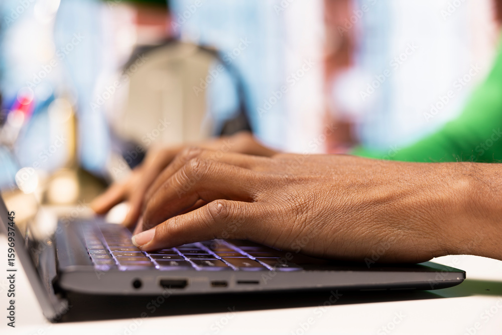 Poster worker at home office desk editing documents on notebook, updating reports and files, typing text. c