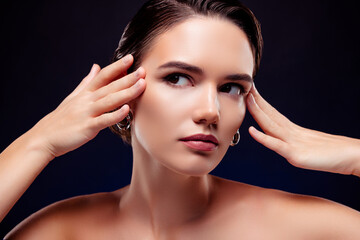 Fototapeta premium Photo portrait of attractive young woman touch skin temples lifting shoulders off isolated on black color background