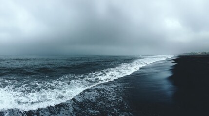Fototapeta premium Dark beach scene under a moody sky