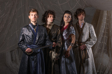 Arabic-style male fashion shoot featuring models in luxurious traditional warrior costumes