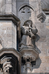 Old Town Hall of Gouda (Stadhuis van Gouda, 1448 - 1450), it is one of oldest Gothic city halls in the Netherlands. Architectural fragments of the facade. Gouda, the Netherlands.