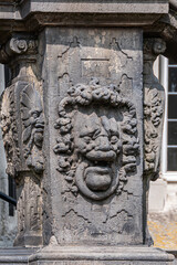 Old Town Hall of Gouda (Stadhuis van Gouda, 1448 - 1450), it is one of oldest Gothic city halls in the Netherlands. Architectural fragments of the facade. Gouda, the Netherlands.