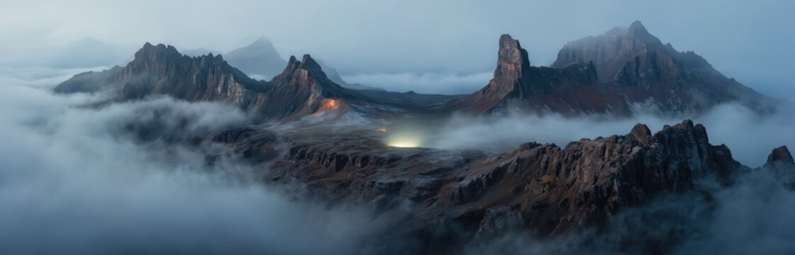 Aerial panorama of Mount Roraima summit shrouded in light mist. Dramatic rock formations glow under soft light. Tabletop mountain landscape offers mystical, otherworldly view ideal for adventure,