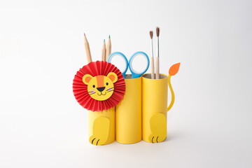 DIY lion toy, handmade pencil holder, toilet paper roll craft concept for kid and kindergarten,...