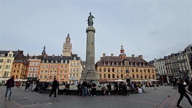 Lille, France - 15 October 2024 - Lille cityscape, La Grand Place square in city center, Flemish mannerist architecture style buildings, and bell tower Chamber of Commerce