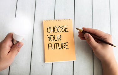 Notepad with handwriting title Choose Your Future.