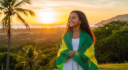 A young girl in Brazil celebrates at sunset with the national flag.