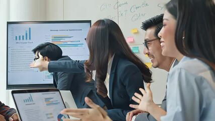 Business professionals discussing charts and data in meeting | Diverse professionals discussing market data in office | Team analyzing reports during business meeting

 - Powered by Adobe