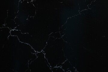 Texture of black marble surface as background, top view