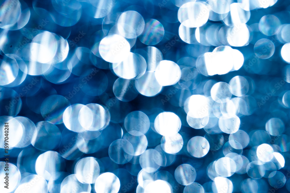 Aufkleber abstract blue lights shimmer and sparkle, creating a bokeh effect. soft circular shapes form a dream