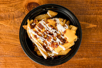 Loaded fries in a container