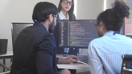 A senior software engineer leads a code review session, mentoring his diverse team on a complex project. Concept for agile development, knowledge transfer, and teamwork. - Powered by Adobe