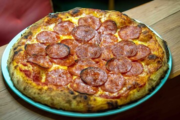 Pepperoni's true rustic pizza with sourdough mass fermented with Levain. A perfect vera pizza, perfect for advertising.