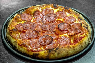 Pepperoni's true rustic pizza with sourdough mass fermented with Levain. A perfect vera pizza, perfect for advertising.