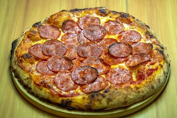 Pepperoni's true rustic pizza with sourdough mass fermented with Levain. A perfect vera pizza, perfect for advertising.