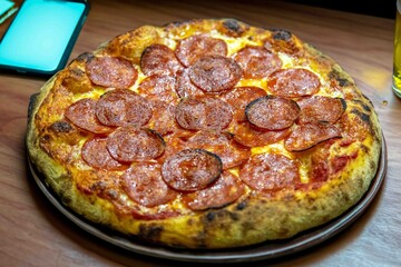 Pepperoni's true rustic pizza with sourdough mass fermented with Levain. A perfect vera pizza, perfect for advertising.