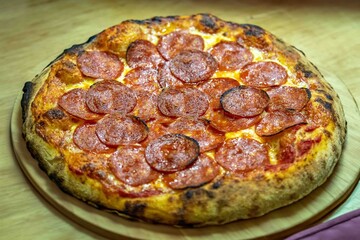 Pepperoni's true rustic pizza with sourdough mass fermented with Levain. A perfect vera pizza, perfect for advertising.