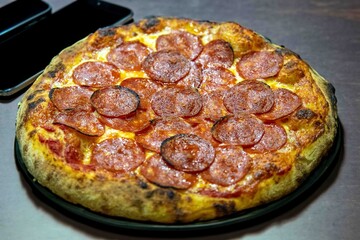 Pepperoni's true rustic pizza with sourdough mass fermented with Levain. A perfect vera pizza, perfect for advertising.