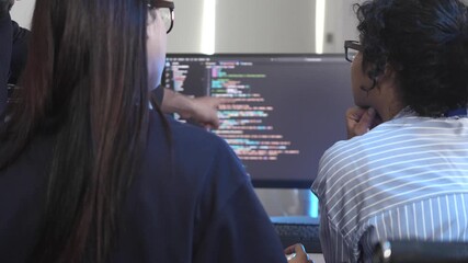 A team of female software developers in a pair programming session, reviewing and debugging code together. Concept for Women in Tech, agile development, and collaboration. - Powered by Adobe