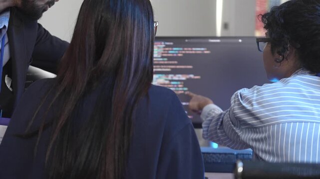 A senior Indian technologist elucidating a complex microservices architecture to a junior developer during a pair programming session on a distributed system. Concept for knowledge transfer in cloud-n