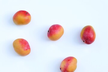 mango on a white background, pattern, summer