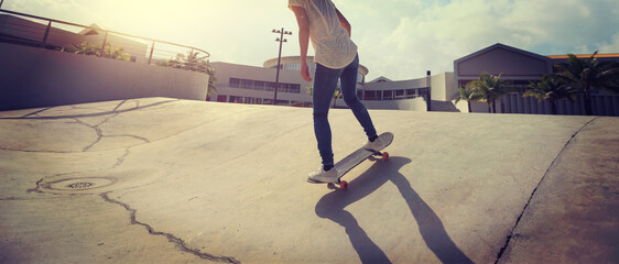 Skateboarder skateboarding at a modern skatepark