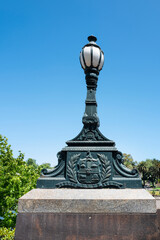 Cast iron lamp post with Vicorian Coat of Arms in the Princes Bridge, Victorian style, upon the...