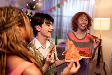 Group of diverse Generation Z friends enjoying a party in cozy house. 