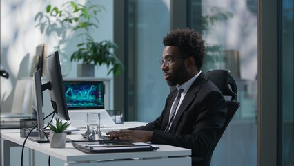 Two people businessmen talking African American employee Caucasian boss leader business working together teamwork discussing project males coworkers looking computer monitor pc online guys in office