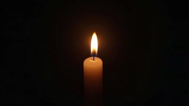Real-time candle flame flickering in dark moody space with soft shadow