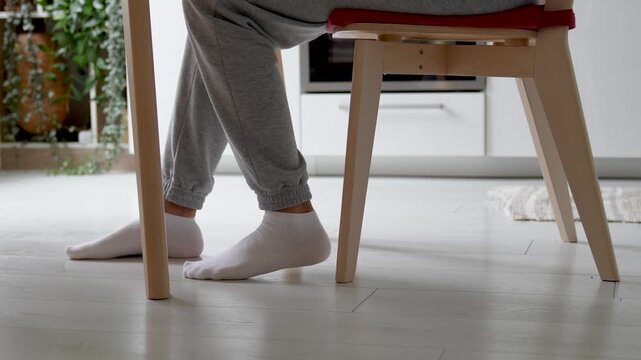 Legs tapping jerking on floor due to ADHD and nervous restless condition. Hyperactivity symptoms due to mental health issues, focus problem, anxiety habit nervous movements and concentration struggles