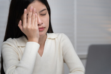 Eye problems, Asian women with tired and irritated eyes, eye rubbing, dry, eye pain after work,...