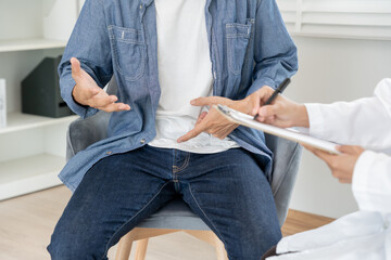 Man use hand point in front of private parts feeling discomfort and consult doctor. Venereal,...