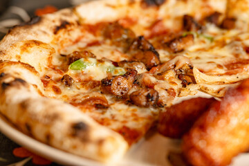 A Close-Up View of a Delicious Pizza with Tasty Toppings and Golden Crust